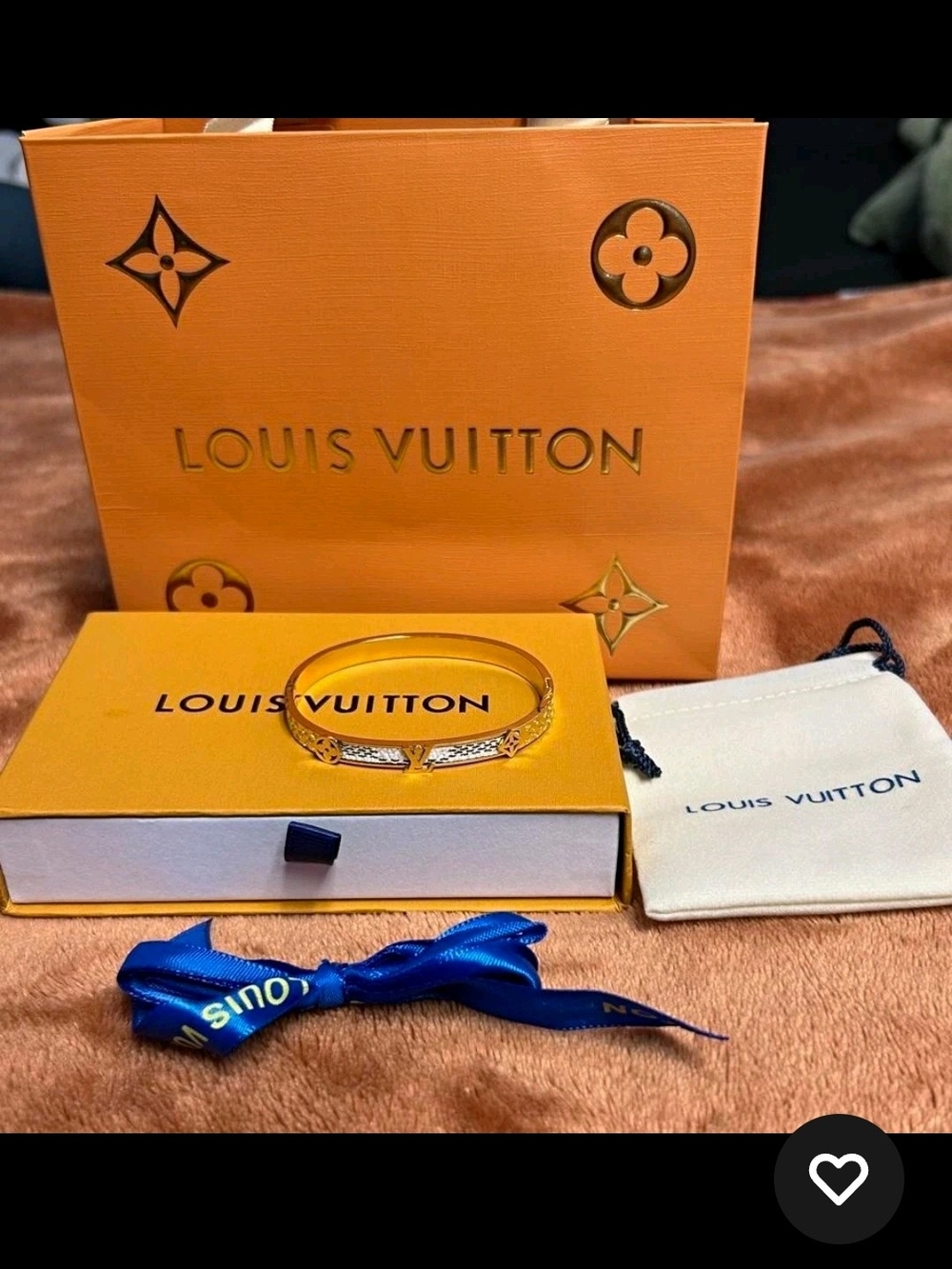 Louis Vuitton Gold Bracelet with Blue Ribbon Accent